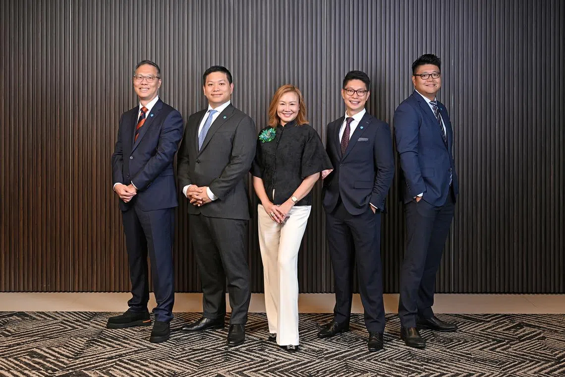 From left: Wengmun Loh, head of dealing Singapore; Ken Sze, head of investment Asia; Evonne Tan, head of private bank Singapore; Shun Wei Ong, head of discretionary portfolio management Singapore; and Stephen Zhu, senior discretionary portfolio manager.