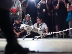 Installation art 'Dynamics of a Dog on a Leash'. Watching a machine strain against a chain and seeing people empathise with its yearning to be free is a preview of one of the most quietly consequential shifts in AI.