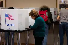 Residents vote at a polling station in Madison, Wisconsin, April 1, 2025. In a race that has grabbed national attention, voters in Wisconsin are being asked to choose between Dane County Judge Susan Crawford and Waukesha County Judge Brad Schimel as the state's newest Supreme Court justice in what has been the most expensive judicial campaign in the nation’s history.  