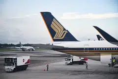 The SIA plane was carrying 276 passengers and crew members, Japanese media said.