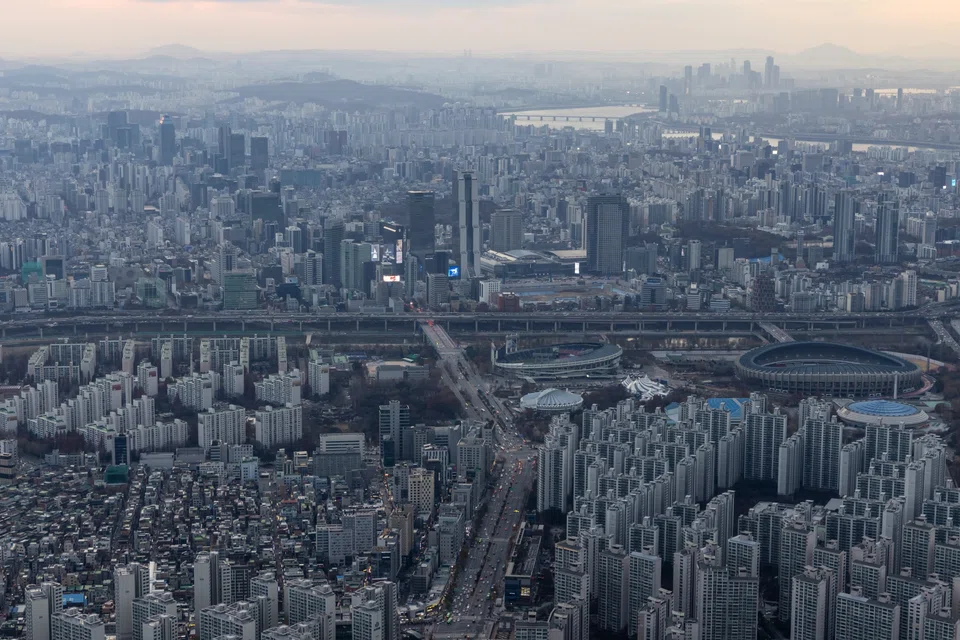 Commercial and residential buildings in Seoul, South Korea. The country's policymakers can ill afford a steep drop in property prices that might exacerbate bad loans and hurt the economy, as happened in Japan in the 1990s.