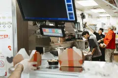 The kitchen at Denny’s in the Jackson Heights neighbourhood of Queens, in New York; the take-out orders were mostly from the Denny’s menu, but some were from the Burger Den and the Meltdown, two delivery-only brands that the chain owns.
