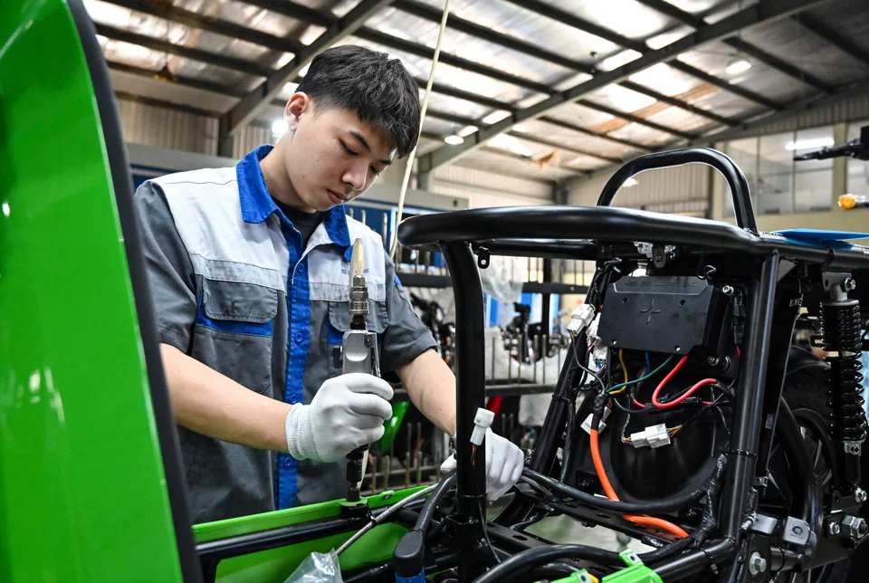 A factory worker in Hanoi. Vietnam is identifying opportunities to explore and use artificial intelligence to amplify the impact of crucial industries, such as manufacturing.