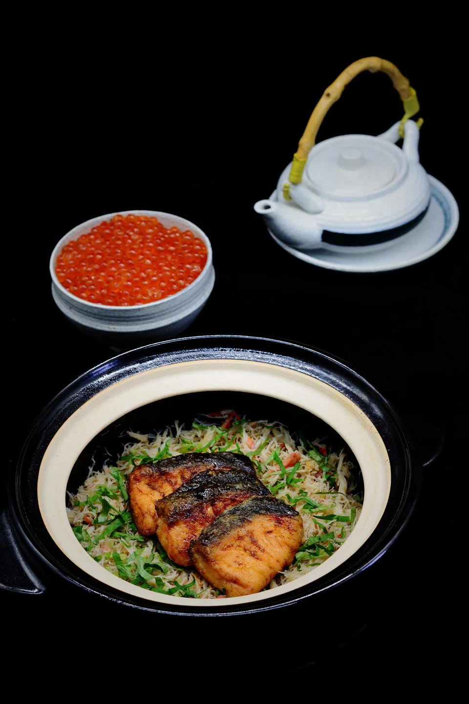 Signature donabe features steaming claypot rice with seasonal ingredients.