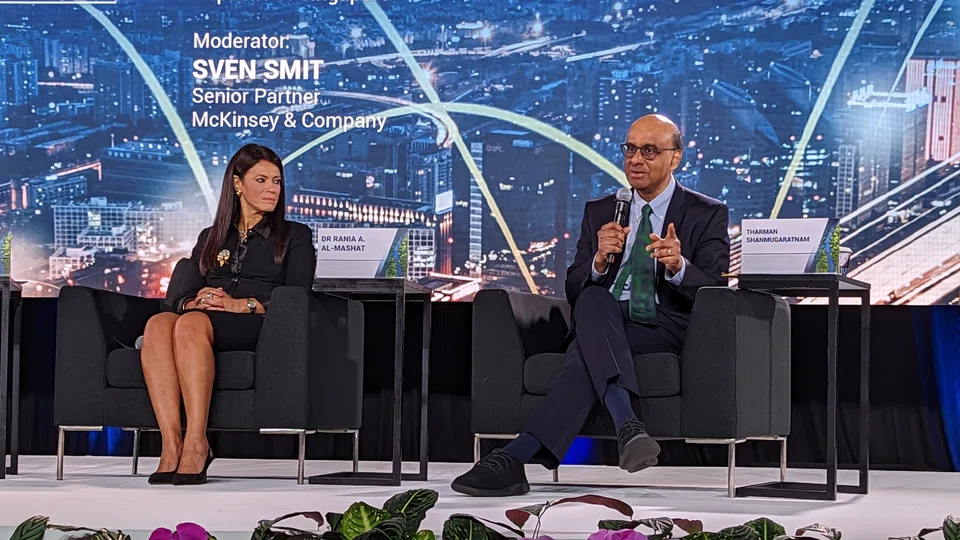 Senior Minister Tharman Shanmugaratnam speaking at a panel on transition finance on Tuesday (Oct 4), with Egypt's Minister of International Cooperation Rania Al-Mashat.