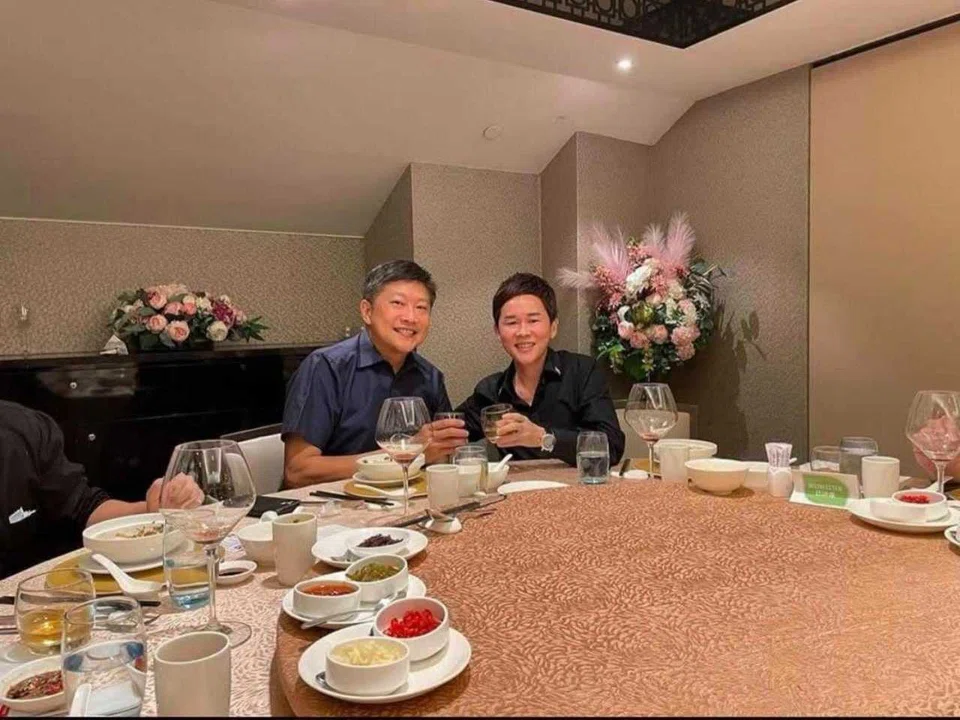 Labour chief Ng Chee Meng (left) was photographed with convicted Fujian gang member Su Haijin in an undated photo.