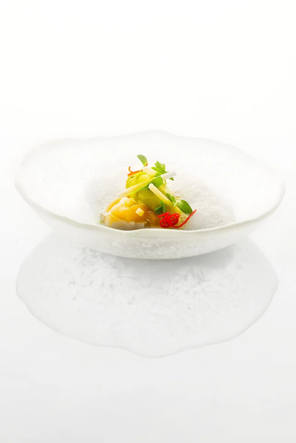 Scallop ceviche gets a twist with tiger's milk presented in sorbet form.