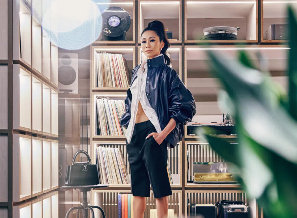  Naphaporn “Lek” Bodiratnangkura, CEO of the Nai Lert Group, is the driving force behind Aman Nai Lert Bangkok, Aman’s new outpost.  She wears a white shirt, black shorts, bomber jacket, Legacy pumps and black Capucines leather bag, all from Louis Vuitton.