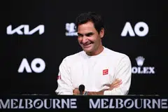 Federer (above) says he hopes Alcaraz, who takes on 79th-ranked Australian Adam Walton in the first round of the Australian Open, will achieve the career Grand Slam.