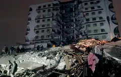 The magnitude 7.8 quake, which hit before sunrise in bitter winter weather, was the worst to strike Turkey this century.