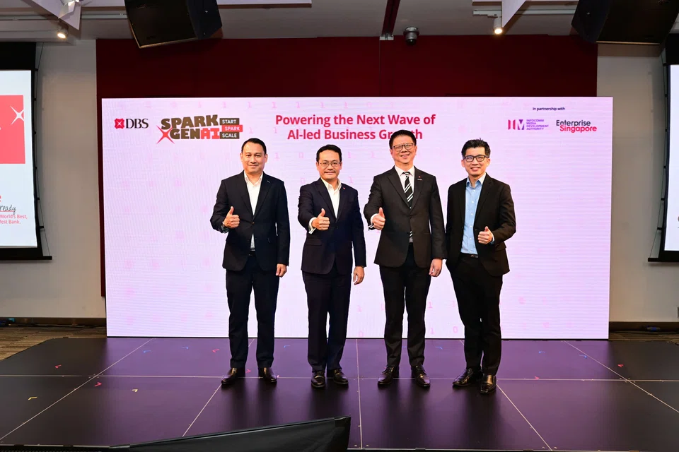 From left: Enterprise SG's assistant managing director for capabilities, product and policy Geoffrey Yeo; DBS' group head of corporate and SME banking Chen Ze Ling; the bank's Singapore country head Lim Him Chuan; and IMDA's assistant chief executive of the enterprise transformation and innovation group Johnson Poh.