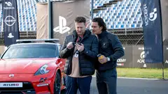 Gran Turismo's director Neil Blomkamp (left) directs a cast that includes Lord of the Rings star Orlando Bloom (right) and Stranger Things actor David Harbour.
