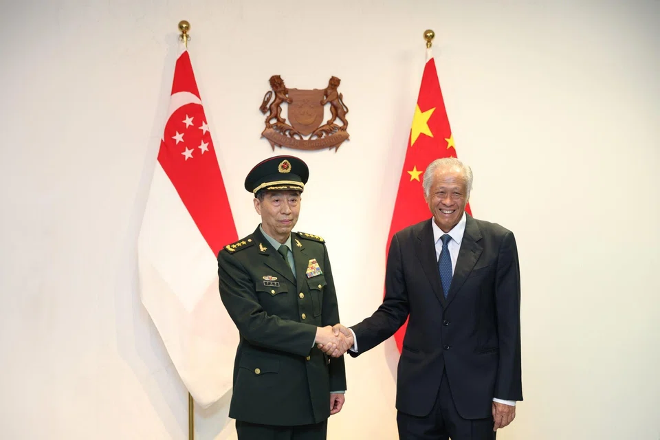 China's defence minister Li Shangfu, with his Singapore counterpart Ng Eng Hen, at Mindef's headquarters in Bukit Gombak on Thursday (Jun 1).   