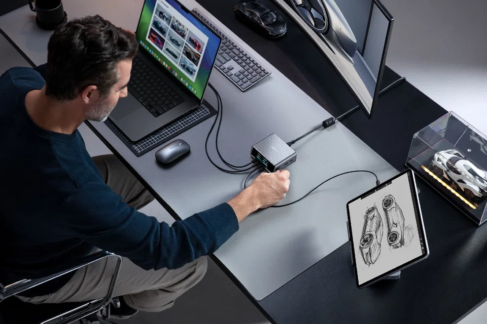 The Anker Prime 250W GaN Charging Station features an LCD screen, twist control button for power modes and seasonal display themes.