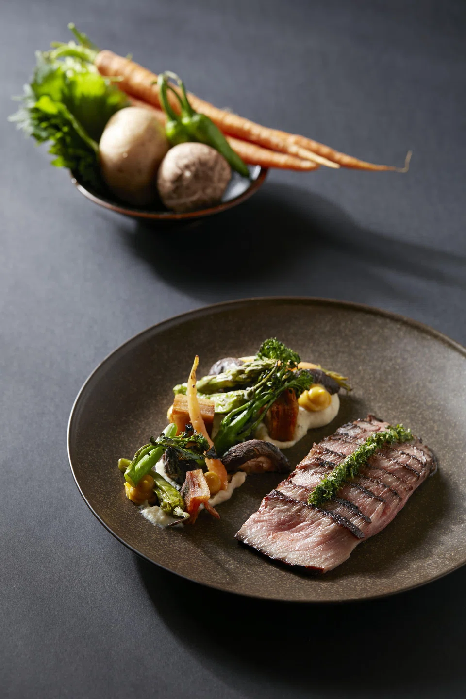 A5 Tri-tip is grilled and topped with zesty shiso chimichurri.