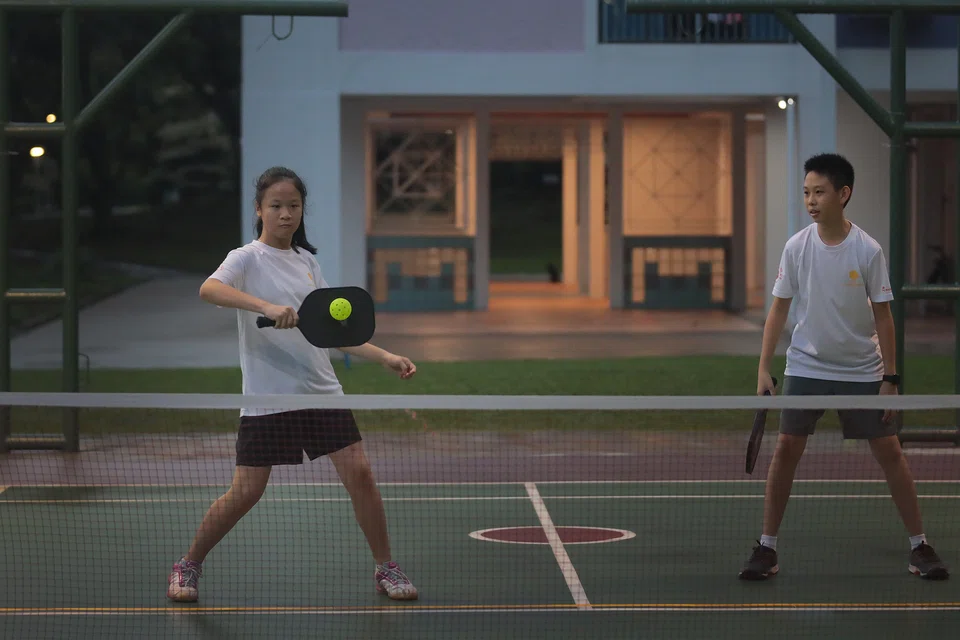 Pickleball is experiencing a significant surge of popularity in Singapore, particularly among younger people.