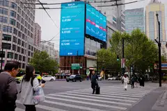 A large screen showing the latest stock exchange and economic data in Shanghai on Apr 20. China’s stock market has emerged as one of the best performers globally as investors sought shelter from the Iran war.