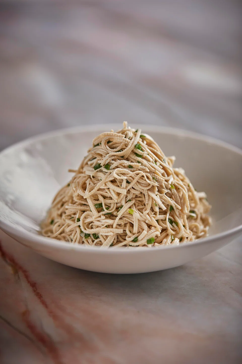 Tasty shredded tofu tossed in sesame oil dressing.