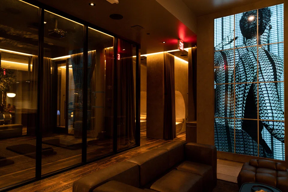 The ground-level lounge at Remedy Place, a social wellness club in Manhattan. Members are encouraged to socialise while getting treatments such as vitamin drips, lymphatic drainage massages and cryotherapy. 