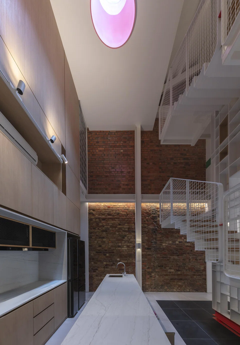A pink skylight brightens the dry kitchen.