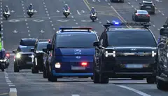 A Ministry of Justice vehicle (blue) carrying South Korea's impeached President Yoon Suk Yeol drives en route to the Seoul Central District Court, Seoul, South Korea, Feb 20, 2025.