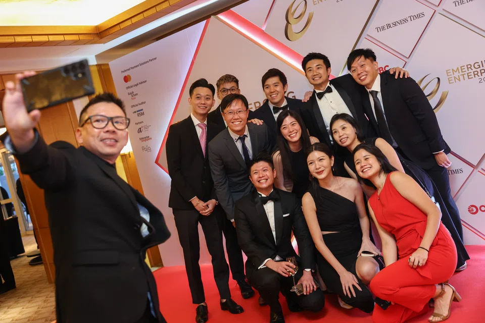 The Pyxis Maritime group all set to take a wefie to add to their album.