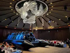 Ai Weiwei’s raft of refugees placed between diners at Capella Singapore.