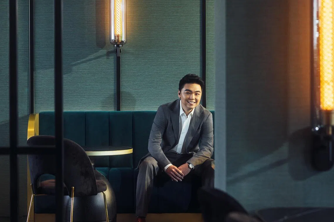 Until recently, Zach Lee has stayed under the radar. He wears a shirt and suit from Boss.