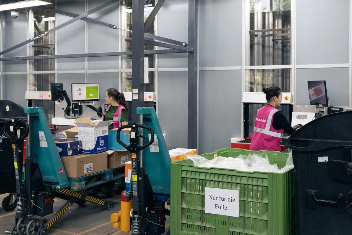 Workers in Austria. While manufacturing declined in both the EU and US, Europe's exports had increased to give new employment opportunities to workers.