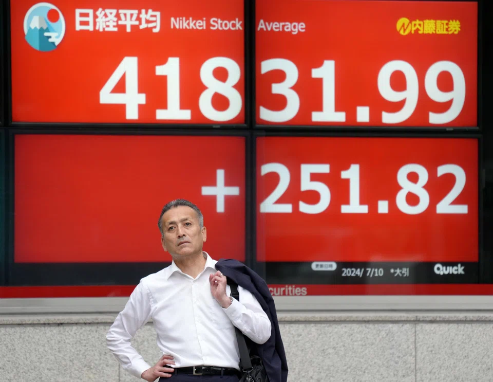 Tokyo, Hong Kong, Sydney, Seoul, Manila and Jakarta stocks rose but Shanghai, Singapore and Wellington edged down at mid day on Friday.