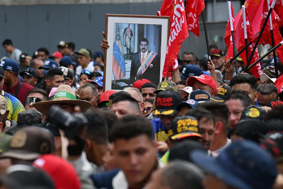 A portrait of ousted Venezuela's President Nicolas Maduro is seen during a pro-government demonstration in Caracas, Venezuela, Jan 4, 2026.