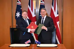 (From left) UK Defence Minister Grant Shapps signed the agreement with his Australian counterpart Richard Marles during a ceremony in parliament in Canberra, Australia, March 21, 2024.  