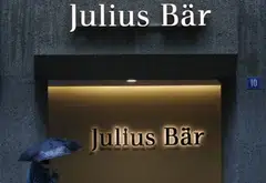 The ratings company affirmed the issuer rating of the Baer holding company at Baa1 while cutting the outlook to negative from positive, Moody’s says.