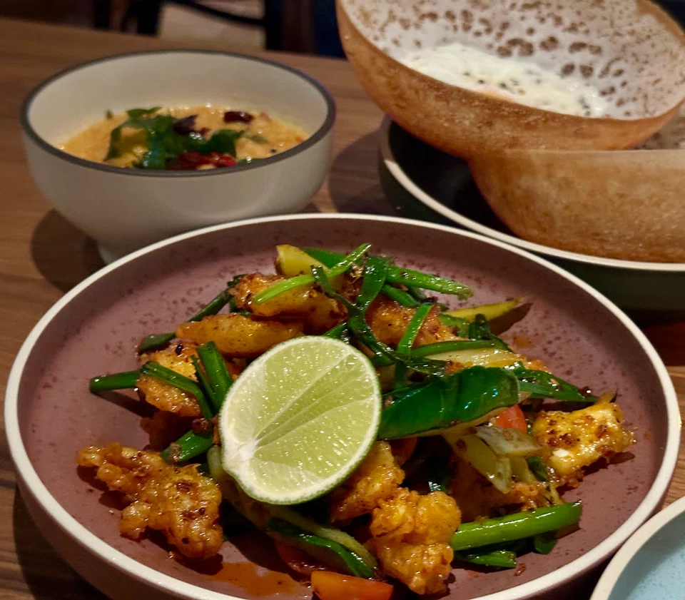 Dallo Baduma features deep-fried calamari tossed in chilli butter.