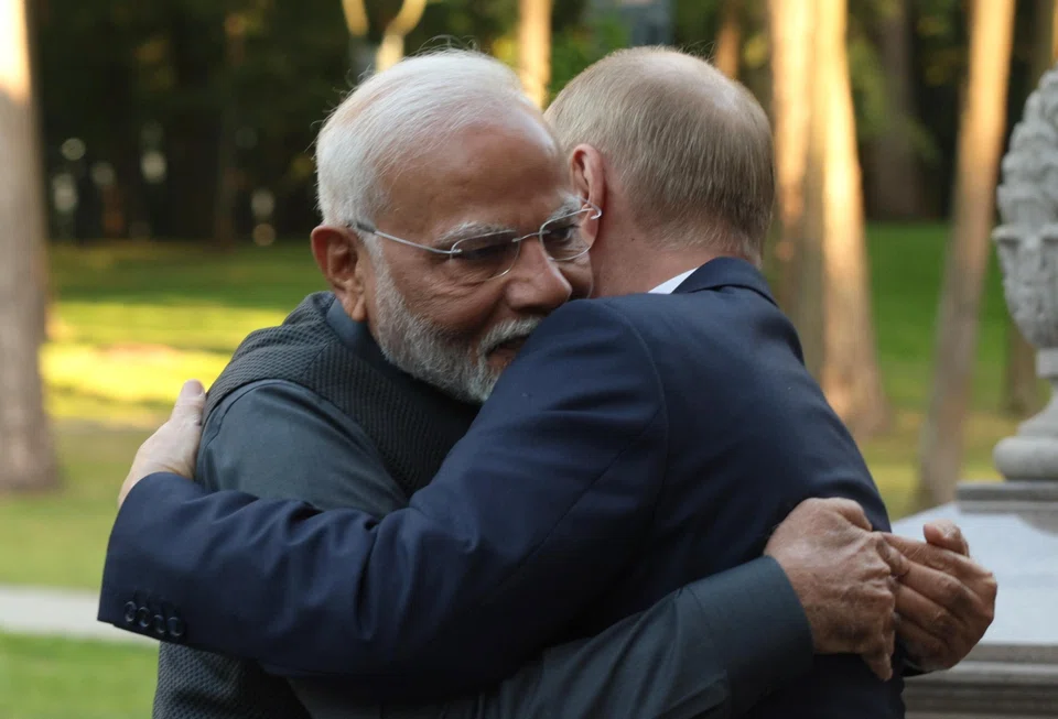 Russian President Vladimir Putin welcomes Indian Prime Minister Narendra Modi (left) before their official meeting in Novo-Ogaryovo residence outside Moscow, Russia, July 8, 2024.