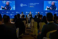 Goodwin Gaw, chairman of Gaw Capital Partners (centre) and Oliver Weisberg, chief executive officer of Blue Pool Capital (right) during the Milken Institute Global Investors' Symposium; Hong Kong will eventually benefit from the integration of the so-called Greater Bay Area, says Gaw.