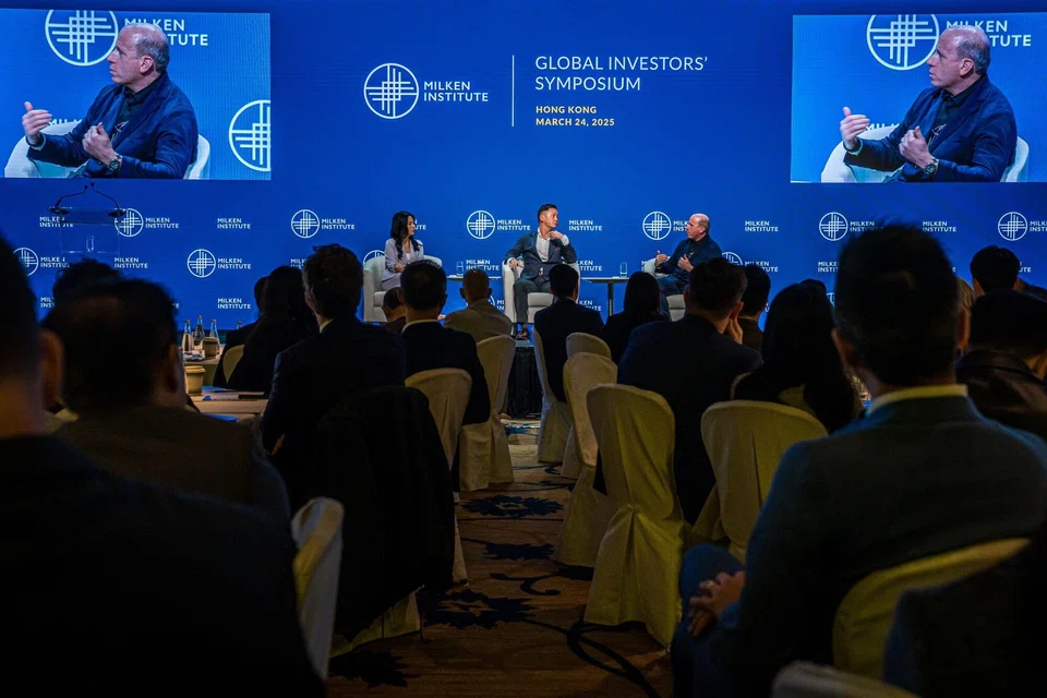 Goodwin Gaw, chairman of Gaw Capital Partners (centre) and Oliver Weisberg, chief executive officer of Blue Pool Capital (right) during the Milken Institute Global Investors' Symposium; Hong Kong will eventually benefit from the integration of the so-called Greater Bay Area, says Gaw.