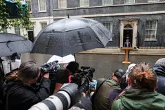 British Prime Minister Rishi Sunak announced the Jul 4 election date outside 10 Downing Street in a downpour. 