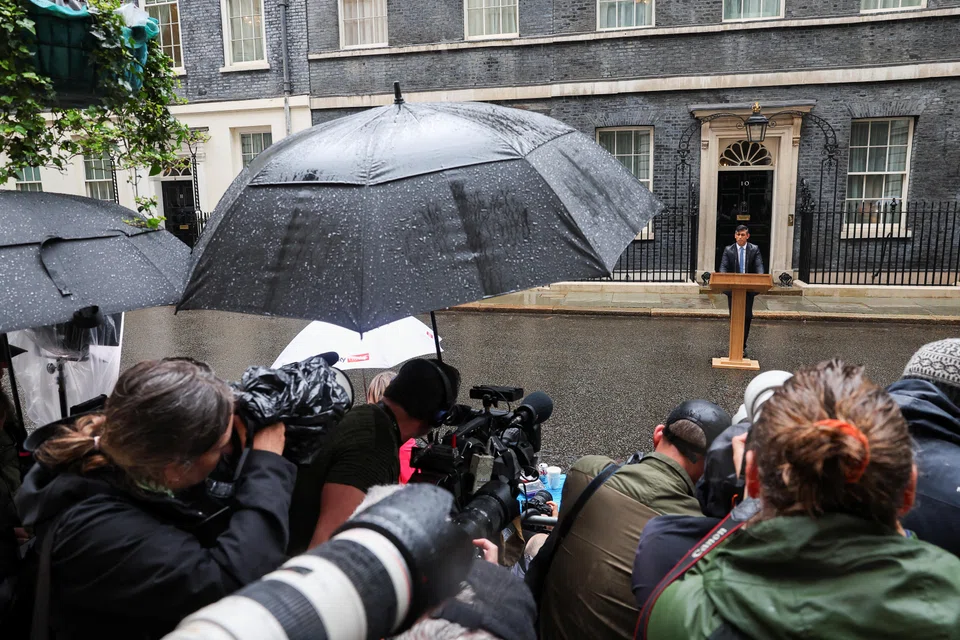 British Prime Minister Rishi Sunak announced the Jul 4 election date outside 10 Downing Street in a downpour. 