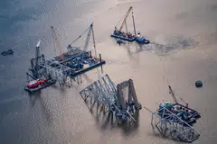 Most of the shipping traffic has been suspended since the accident, though some terminal operations outside the affected area have resumed.