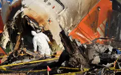 Investigators will analyse data on 107 mobile phones recovered from the crash site, including text messages, for clues on what happened leading up to the crash.