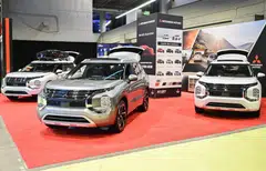 Mitsubishi Motors at the Montreal Electric Vehicle Show. US protectionism against China is creating an opportunity for Japanese carmakers to bring EV production to North America.