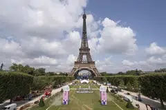 Preparations in public gardens near the Eiffel Tower ahead of the Olympic Games in Paris, France, July 24, 2024. After the Olympics, Air France - which is one of the event sponsors - expects travel to and from Paris to return to normal, with the summer games likely to spark renewed interest in the destination. 