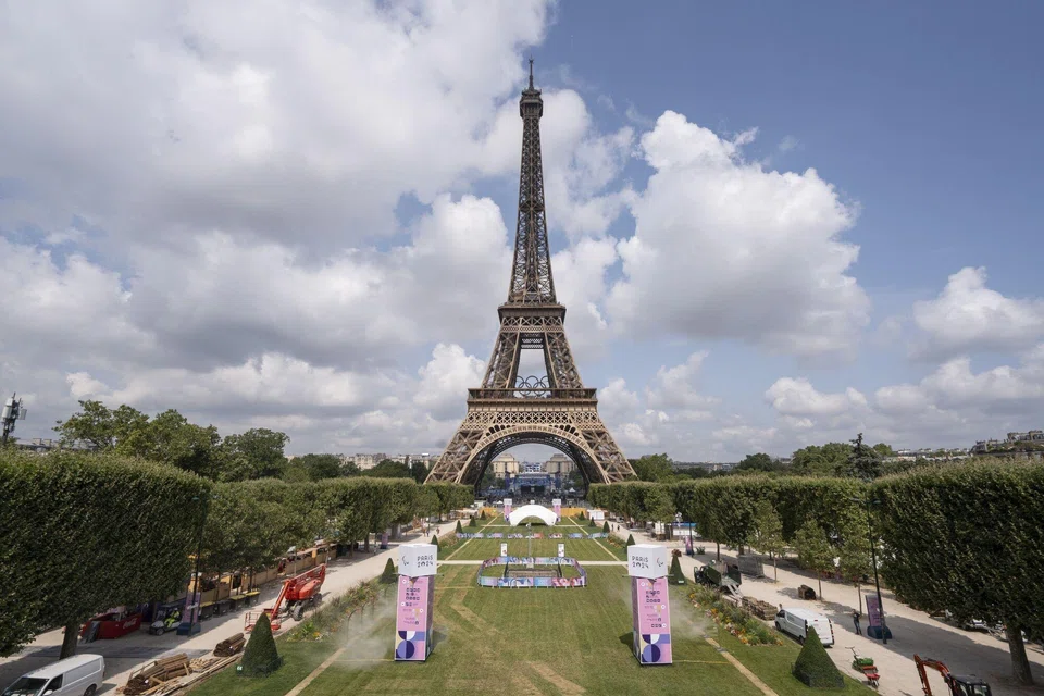 Preparations in public gardens near the Eiffel Tower ahead of the Olympic Games in Paris, France, July 24, 2024. After the Olympics, Air France - which is one of the event sponsors - expects travel to and from Paris to return to normal, with the summer games likely to spark renewed interest in the destination. 