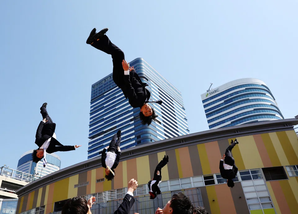 The unusual sight of Japanese corporate warriors being launched seven metres into the air in synchronised routines won them an online commercial spot to advertise the stretchy Uniqlo suits they wear for their performances.