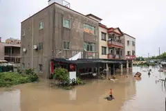 A partially submerged building following heavy rains caused by Typhoon Haikui in Xiamen, in China's southern Fujian province, in September 2023. 