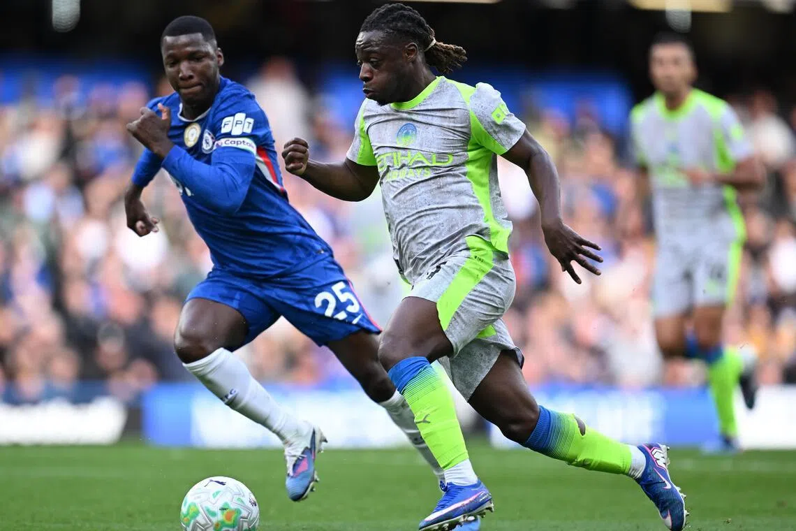 Manchester City's Jeremy Doku (centre) faces off against Chelsea’s Moises Caicedo during their EPL match in London on Apr 12. City’s 3-0 win over Chelsea was more than just three points – it was a statement. 