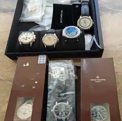 Watches seized by the police in their investigation into Chen Zhi's scam syndicate.