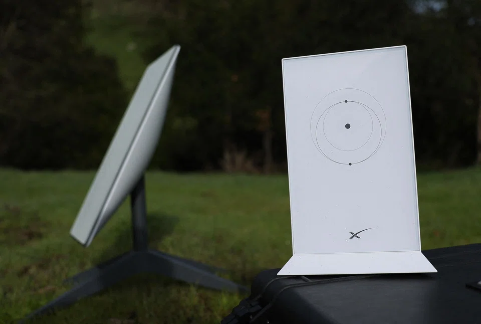 A Starlink dish and router in California. The company has 5,600 active satellites deployed, but plans to add tens of thousands more.