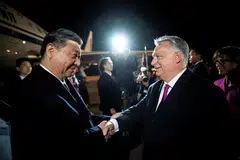 Hungarian Prime Minister Viktor Orban welcomes Chinese President Xi Jinping at the Ferenc Liszt International Airport in Budapest, Hungary, May 8, 2024. 